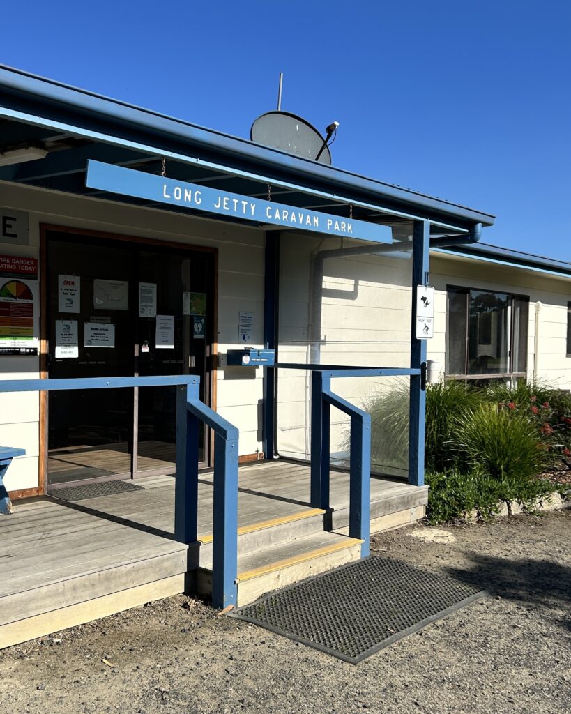 A outside image of BIG4 Long Jetty Caravan Park's Reception where you'll check in, buy snacks, ice, bait and more!