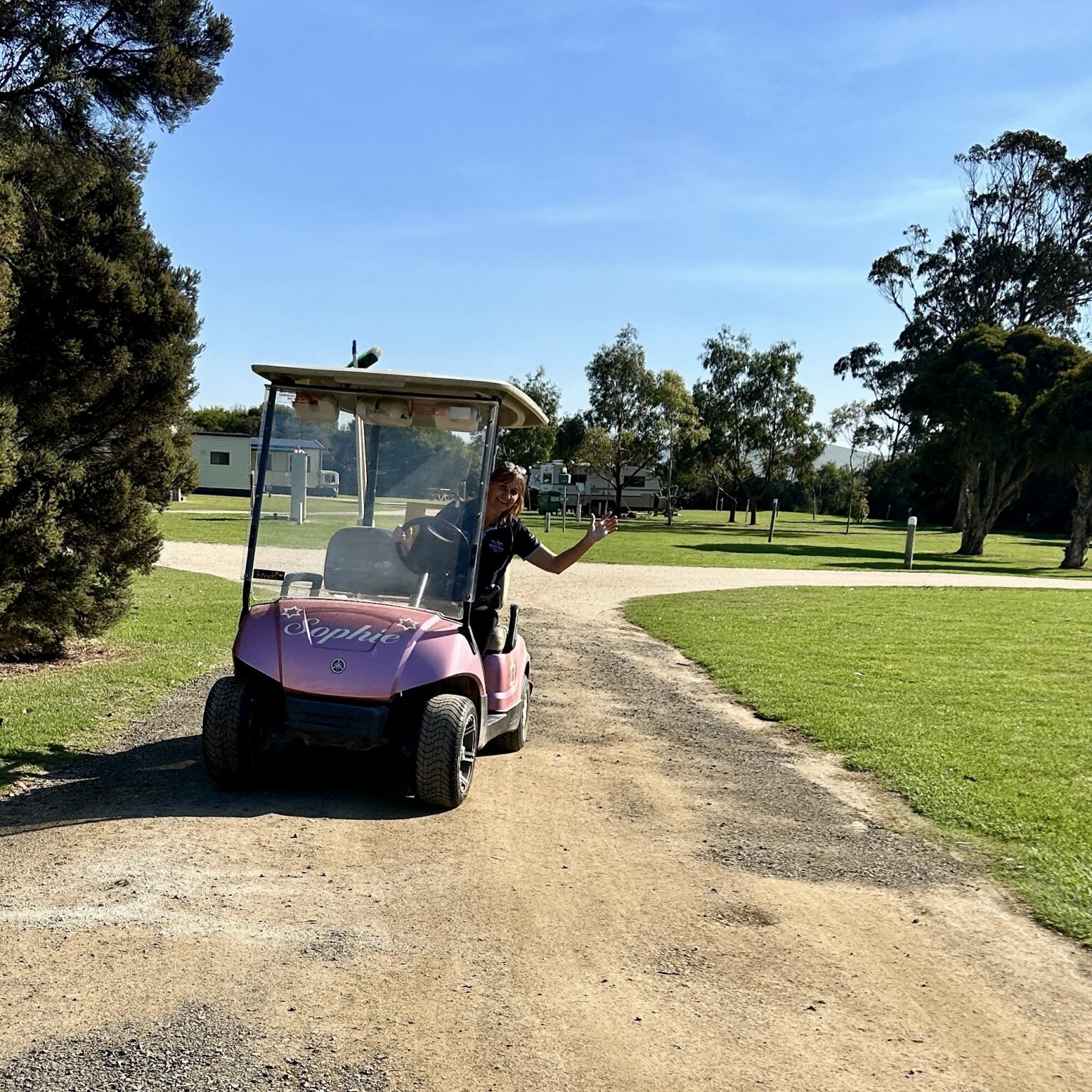 A woman drivinng a buggy cart at BIG4 Long Jetty Caravan Park